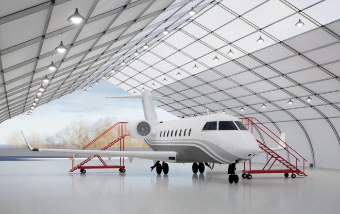 an airplane inside a tension fabric structure